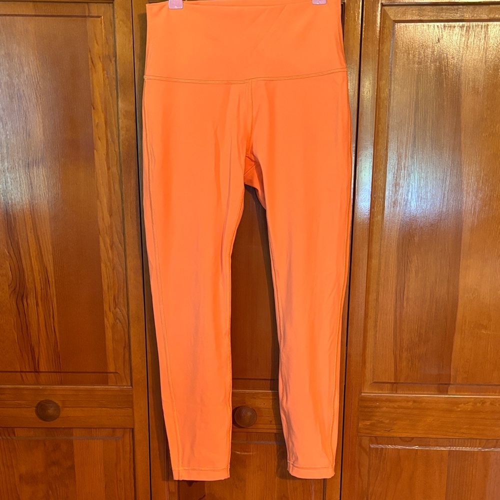 Lululemon wunder under high rise tight 25” in orange soda *flaw*